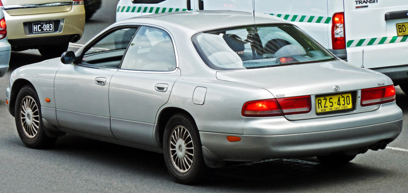 The 929 had a long rear overhang, a wide tail, and flat haunches